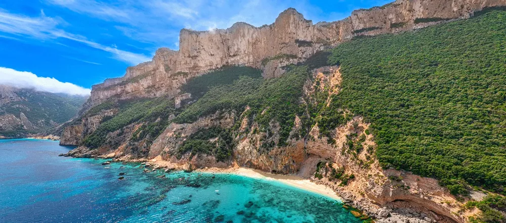 Cala dei Gabbiani’s white shoreline and turquoise water in Sardinia